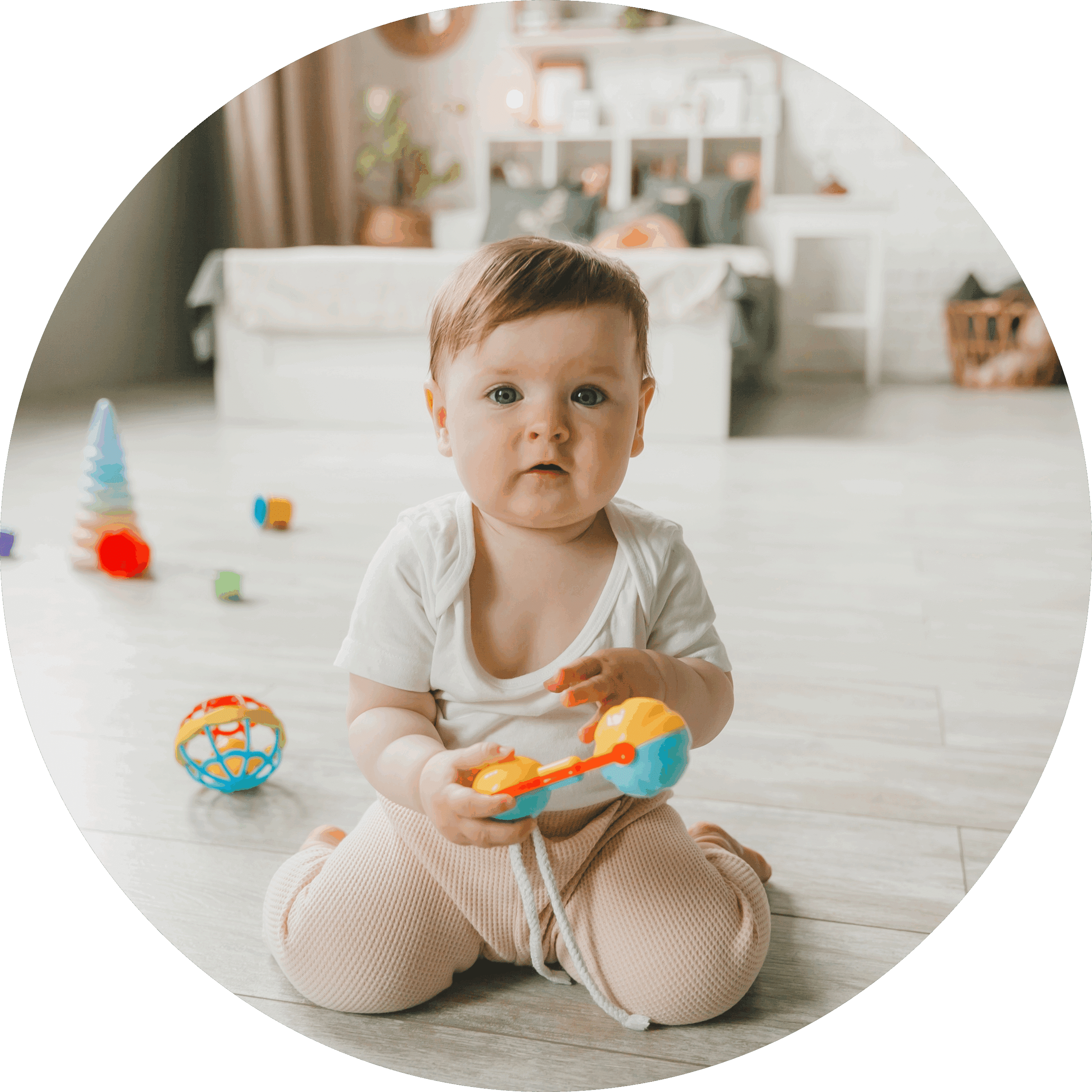baby playing with colorful toy